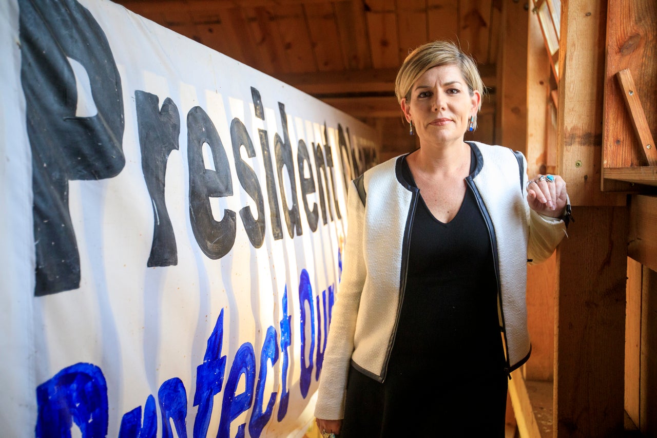 Jane Kleeb, chair of the Nebraska Democratic Party and activist against the Keystone XL pipeline, poses on Sept. 19 at a solar barn she helped build. The barn sits along the proposed path of the Keystone XL pipeline in Bradshaw, Nebraska. 