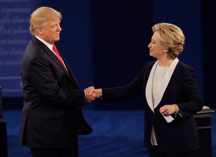 Trump shakes hands with Clinton following the second presidential debate, Oct. 9, 2016.