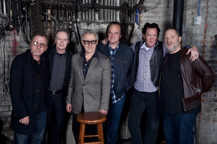 Actors Tim Roth, Steve Buscemi, Harvey Keitel, Quentin Tarantino, Michael Madsen and producer Harvey Weinstein pose duri