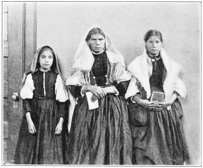 Three Italian immigrants at Ellis Island.