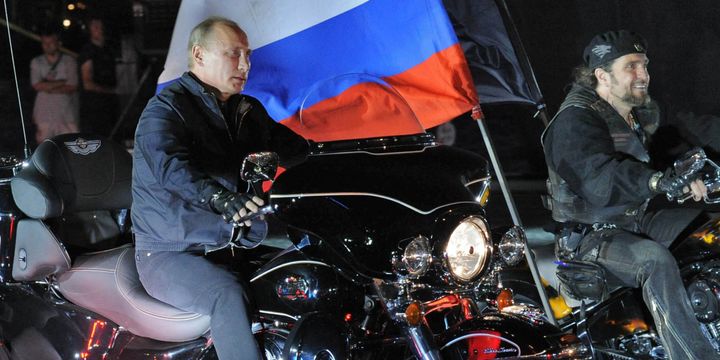 (Left): President of Russia Vladimir Putin, (Right): Leader of the Night Wolves Alexander Zaldostanov (the Surgeon)