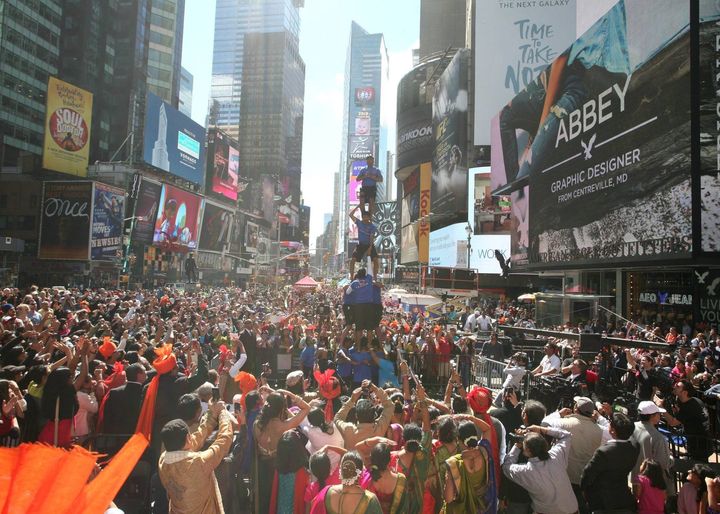 Revelers gather around performers at a previous Diwali at Times Square festival.
