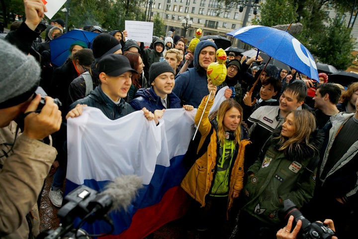 Protests have erupted across Russia on Putin's birthday