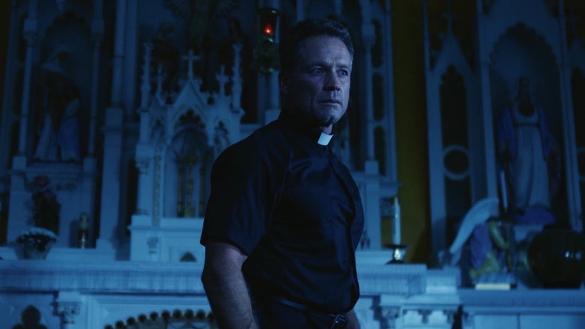 <strong>Rick Ravanello as believer Father Cutler</strong>