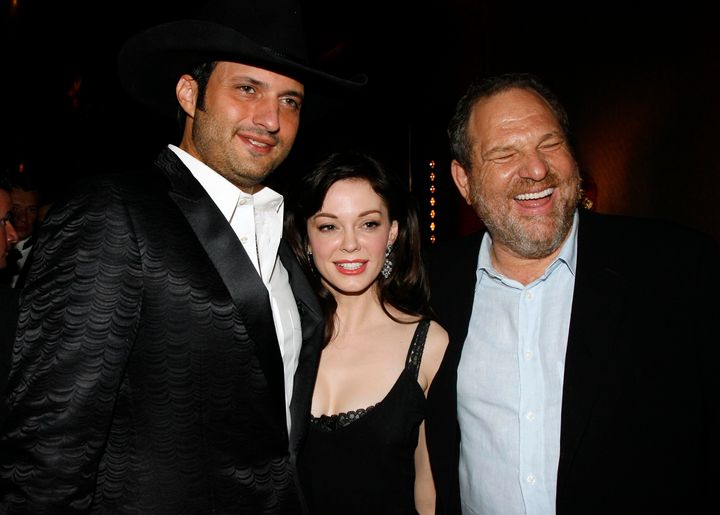  Rose McGowan (center) poses with director and then-boyfriend Robert Rodriguez (left) and Harvey Weinstein (right) in 2007. Last year, McGowan tweeted that “her ex sold our movie to my rapist for distribution.” Some have speculated that she was referring to Rodriguez and Weinstein, respectively.