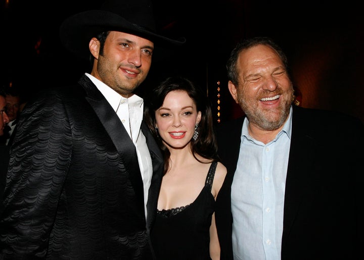 Rose McGowan (center) poses with director and then-boyfriend Robert Rodriguez (left) and Harvey Weinstein (right) in 2007. Last year, McGowan tweeted that “her ex sold our movie to my rapist for distribution.” Some have speculated that she was referring to Rodriguez and Weinstein, respectively.