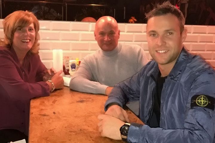 Harron with his parents Graham and Patricia, who have called for Britons to stop visiting Dubai 