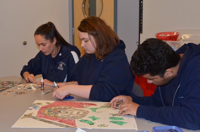 Foxborough Regional Charter School High school students selecting stamps to use on two Holocaust Stamp Project stamps collag