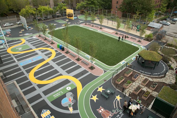 <p>The old asphalt schoolyard at La Cima Charter School in Brooklyn, NY was converted by The Trust for Public Land to a green community playground that also captures stormwater runoff.</p>