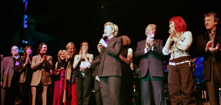  Hillary Clinton surrounded by family and celebrities during her 53rd birthday celebration in 2000. 