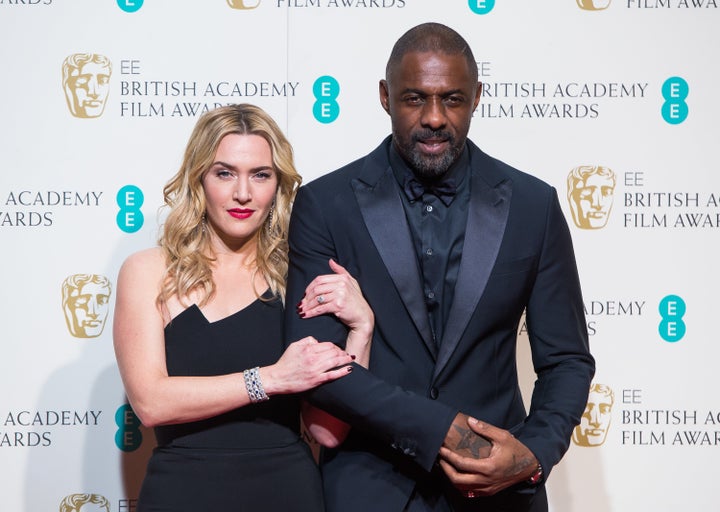 Kate Winslet and Idris Elba pose in the winners room at the EE British Academy Film Awards at The Royal Opera House on Feb. 14, 2016, in London, England.