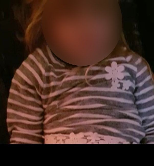 Police took the unusual step of releasing images of the little girl because they feared she was still in danger. Image has been blurred following an arrest in the case 