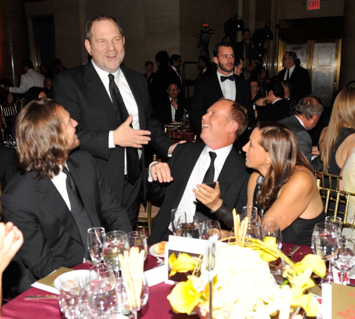 Donna Karan, right, pictured with Harvey Weinstein, second from left, at the amfAR New York Gala in 2011.