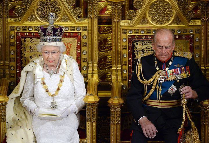 Ordinary People 'Are Being Shafted': Queen Elizabeth II siting alongside the Duke of Edinburgh as she delivers her speech in the House of Lords during the State Opening of Parliament in 2014