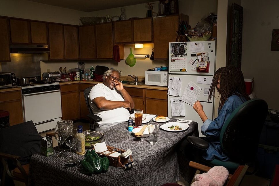 Sálongo and Daphne eat dinner in Mississippi.