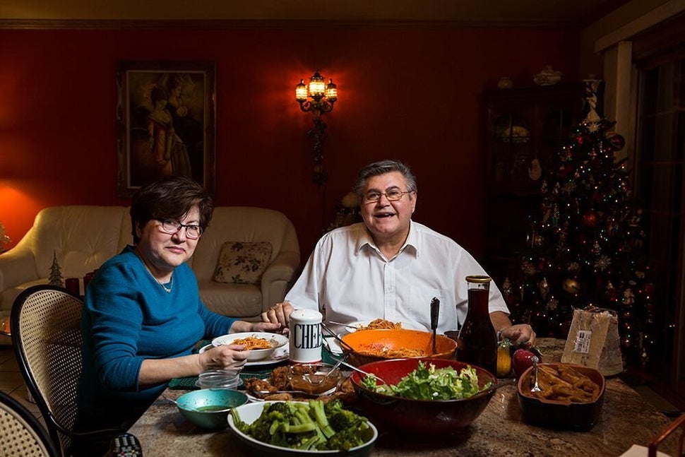 Rina and Giuseppe eat dinner in Wisconsin.