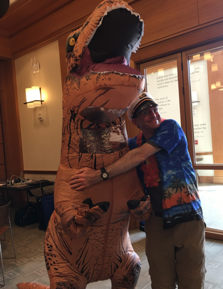 <p> Corey Snow at a developer conference at Harvard University - As the captain of the conference, Corey says goodbye to dinosaur (legacy) technology as he champions migration to new technologies like mobile, social, cloud, IoT and AI. </p>