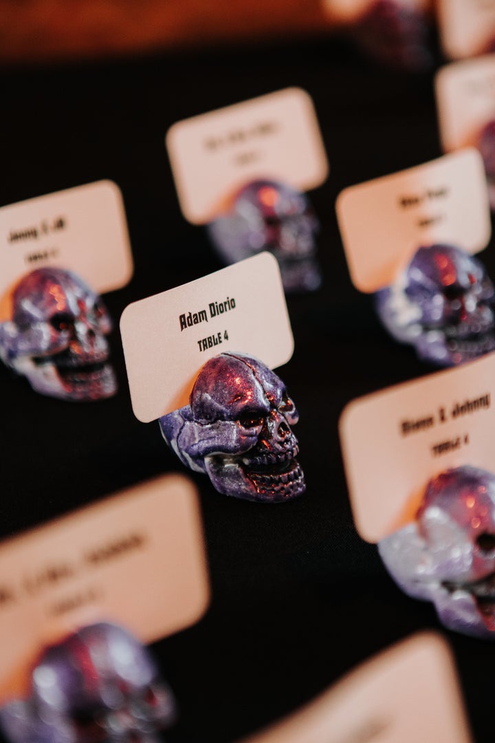 They opted for skull place cards for the October wedding, but the bride said she likes to keep those Halloween vibes going all year long.