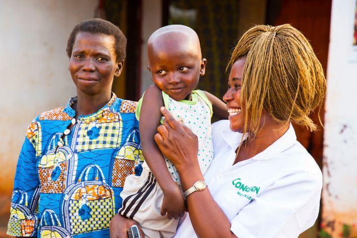Concern Nutrition Officer Grekpengou Mathilde with five-year-old Mario Doutifed and his mother, Remadere Clemantine, at a Concern-supported health centre in Boyal, Central African Republic.