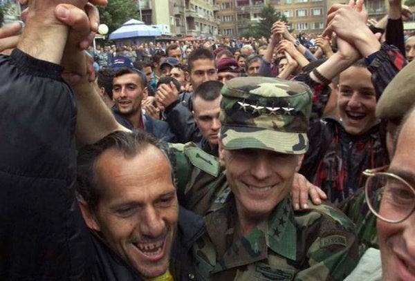 The above picture is General Clark in victory with the citizens of Kosovo when they returned to their homes