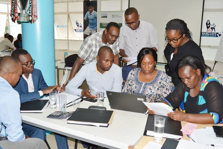 Barclays Bank of Kenya employees engaging in group discussions during AIMS/ECAF training held last year