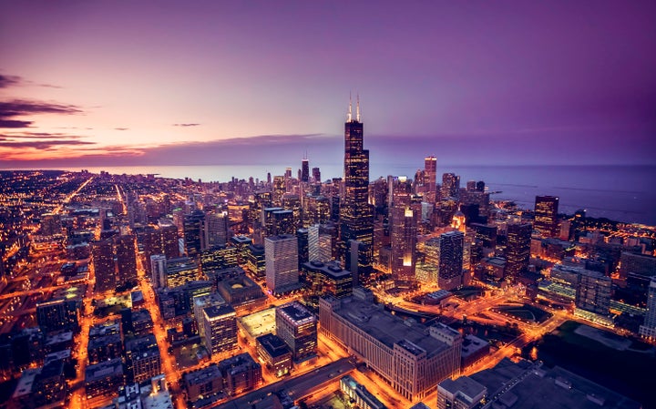 Downtown Chicago is still lit up at night.