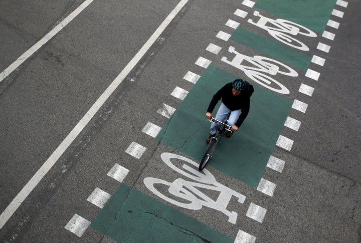 A cyclist pedals along Chicago's network of bike lanes.