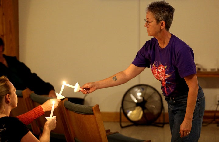 Rev. Dee Lundberg holds a vigil at Casper's United Church Of Christ after the deadly mass shooting in Las Vegas.