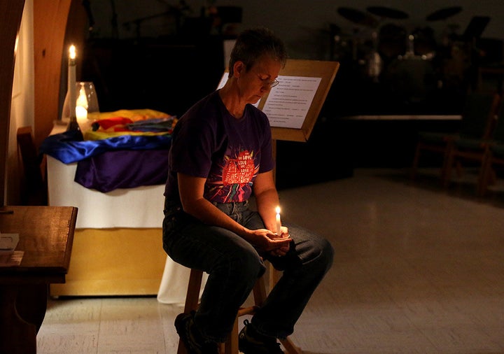 Rev. Dee Lundberg holds a vigil at Casper's United Church Of Christ after the deadly mass shooting in Las Vegas.