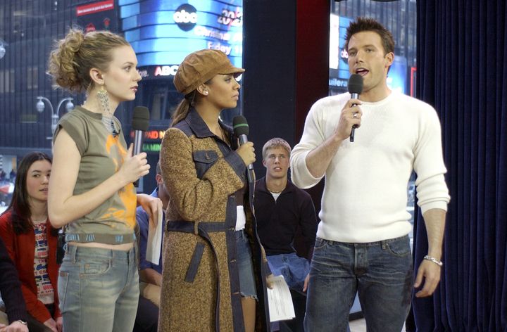 Ben Affleck with 'TRL' presenters Hilarie Burton and La La in 2003