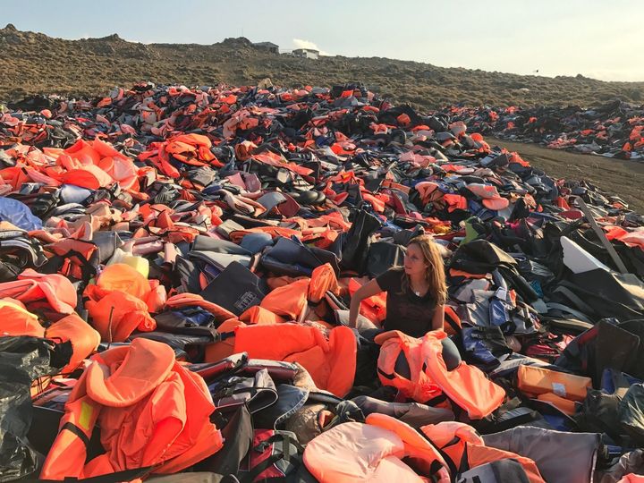 <p>Longobardi sorts through the vast piles of plastic safety gear along the shores of Lesvos.</p>