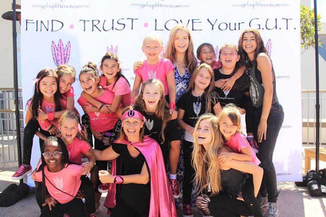 Here I am in my Uplifter Superhero costume with our amazing ambassadors and performers, pictured counter clockwise starting with me: Aimee, Jade, Mia, Miya, Layla, Eloise, Scarlett, Shiloh, Ivy, Lily, Raegan, Olivia, Mackenzie, Damoni, Maya, and Brooke. 