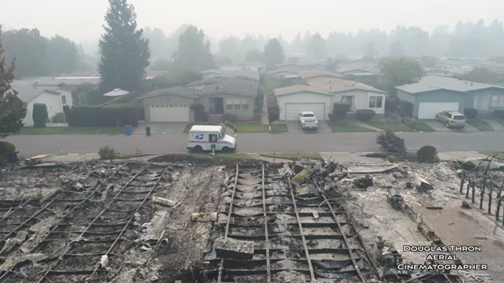 The drone's pilot, Douglas Thron, said the destruction changed his outlook on things, as he thought the neighborhood would ha
