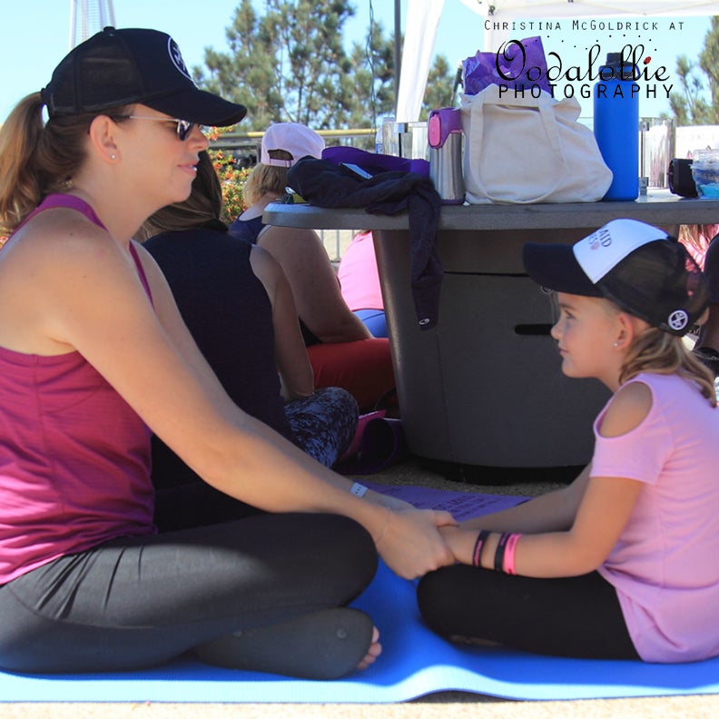 Sara and her daughter, Hannah, have a sweet moment while participating in the Listen & Share exercise.