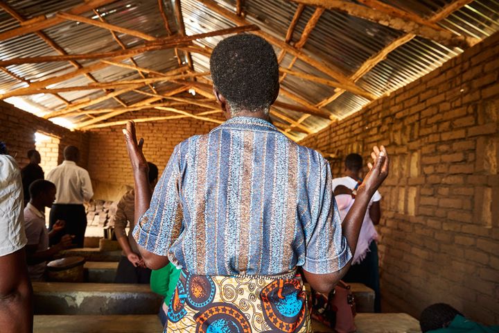 A woman prays during a Sunday morning service at Well of Life Church, Luchenza, southern Malawi.