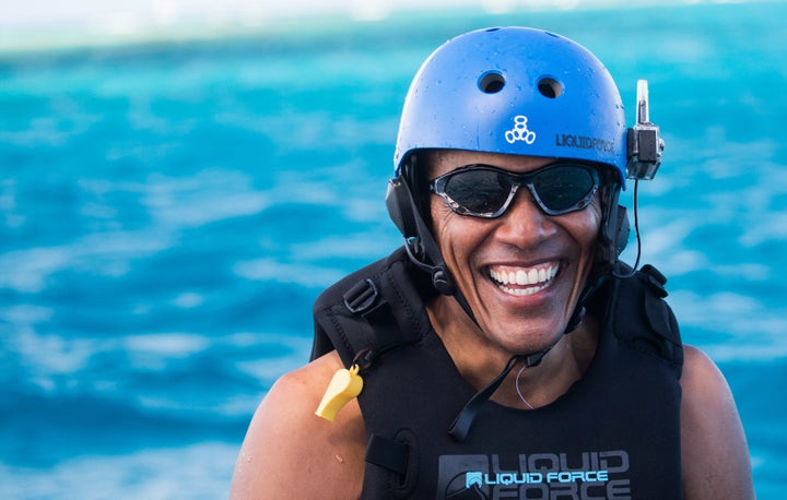 Obama takes a break from learning to kitesurf at Richard Branson's Necker Island retreat on February 1, 2017 in the British Virgin Islands.