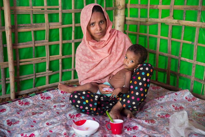 Layru* and her two-year-old daughter Hala* at a Concern nutrition support center at Hakim Para camp in Bangladesh. Hala weighed less than 12 pounds when admitted. Layru says the family walked for 15 days to escape Myanmar, with little or no food along the way. She has three other children. *Names changed for security