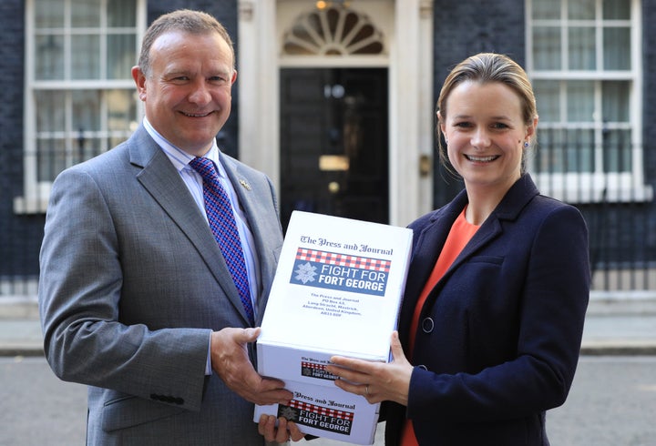 SNP MP Drew Hendry, left, has invited Theresa May to hear the impact Universal Credit is having on his constituents.