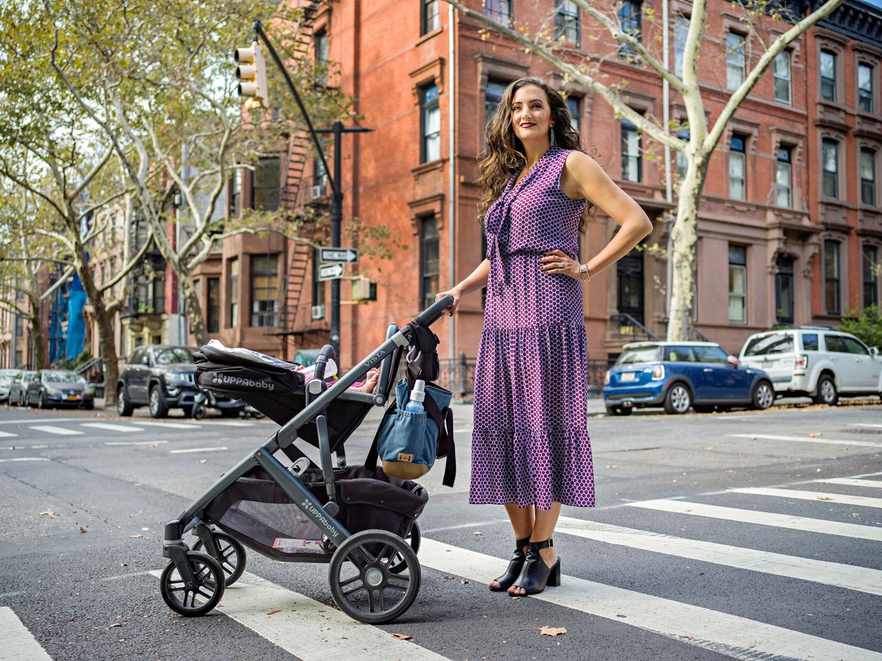 Rent the Runway co-founder Jennifer Hyman and her baby, Aurora, in Brooklyn, New York.