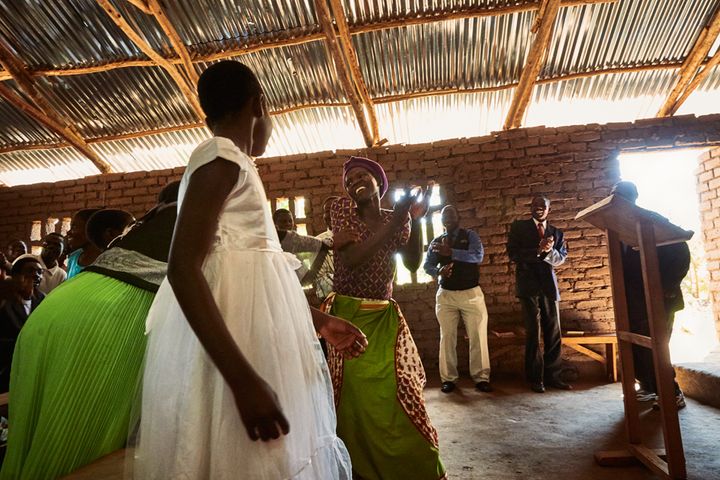 Churchgoers sing and dance during a Sunday morning service at Well of Life Church, Luchenza, southern Malawi, 2017.