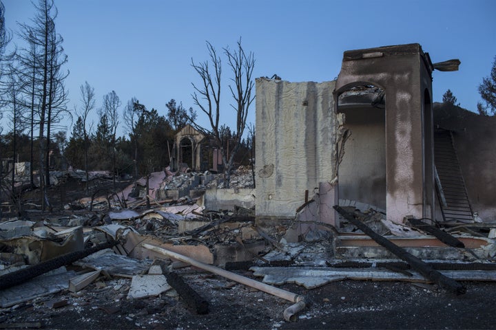 The ruins of houses destroyed by the Tubbs Fire are seen near Fountaingrove Parkway on October 14, 2017 in Santa Rosa, Califo