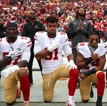 Members of the San Francisco 49ers protest racism and racial violence during playing of National Anthem.