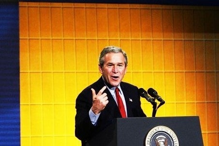 <p>President George W. Bush speaks to corporate executives, economists, and academics during the closing of the two-day White House Conference on the Economy on December 16, 2004.</p>