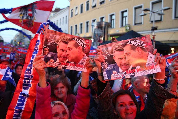 Supporters of the Austrian Freedom Party (FPOe) attend the party's final election campaign rally in Vienna on October 13