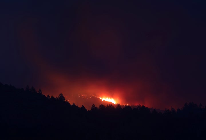 A wildfire burns in mountains above Sonoma, California, U.S., October 14, 2017. (REUTERS/Jim Urquhart)