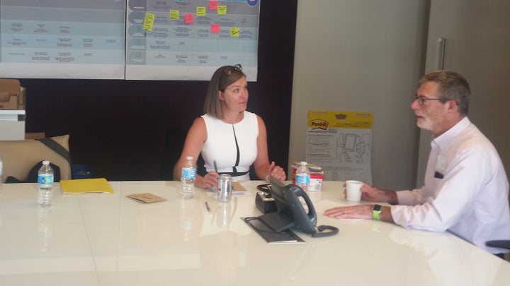 <p>Washington D.C. Participant Bob Fox (FOX Architects) discusses ideas with Suzanne Maynard (CCG).</p>
