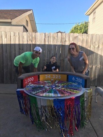 Anthony Alfano and his parents with his "Wheel Of Fortune" costume.