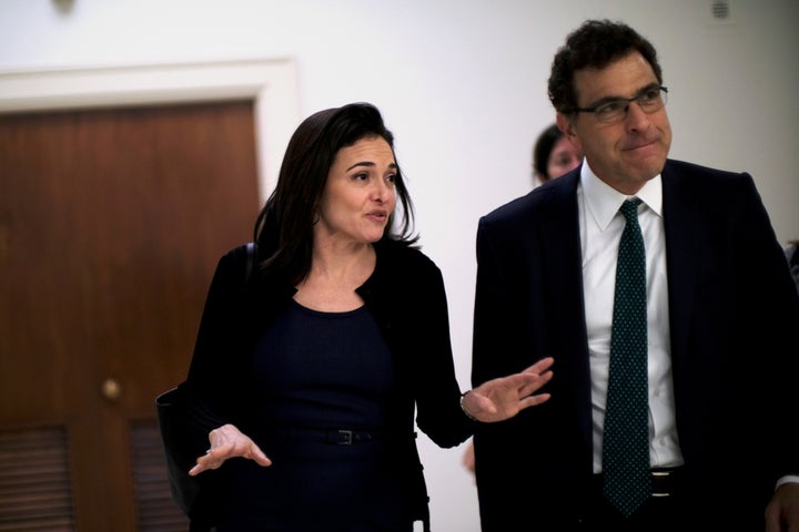 Sheryl Sandberg, Facebook's chief operating officer, and Elliot Schrage, its vice president of global communications and public policy, meet with lawmakers on Capitol Hill on Oct. 12.