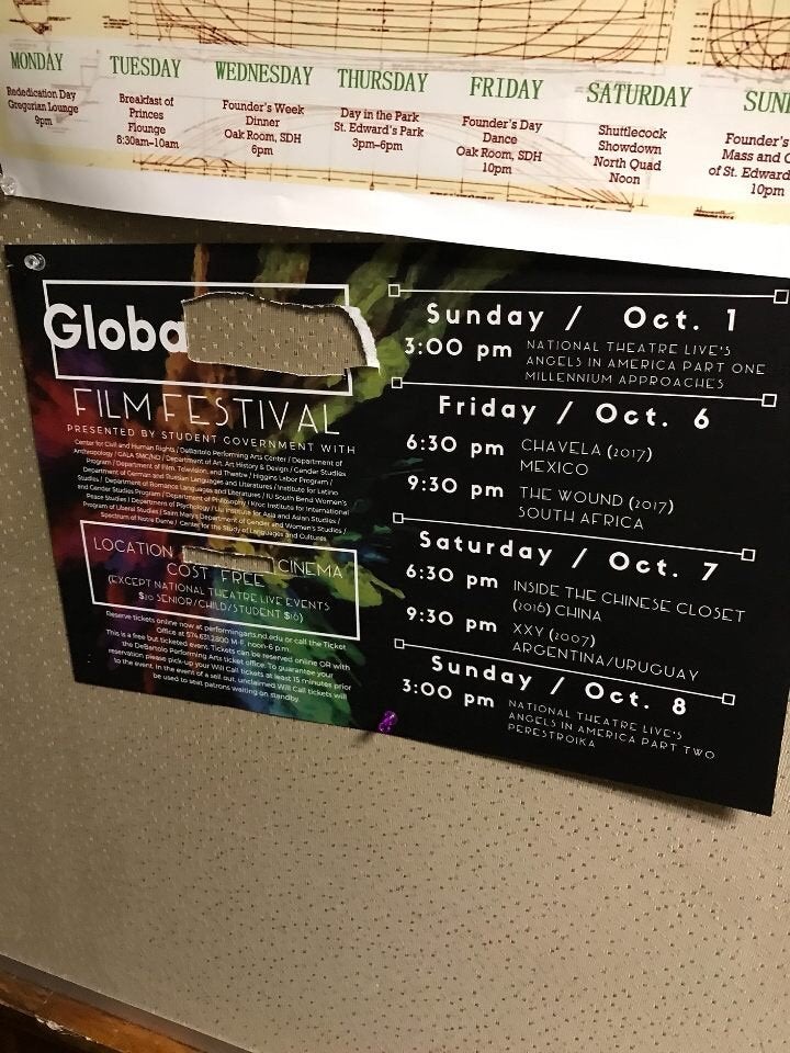 A defiled sign promoting the GlobaLGBTQ Film Festival at the University of Notre Dame