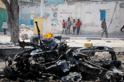 <p>Wreckage of Suicide Car Bomb in Mogadishu. “<em>Poverty and not Religion is one of the main reasons that compels anyone to join al-Shabab</em>”</p>